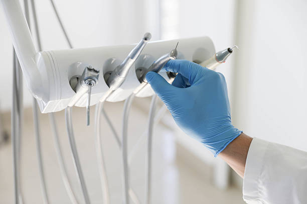 Professional Root Canal Treatment technician working in Midway North, TX